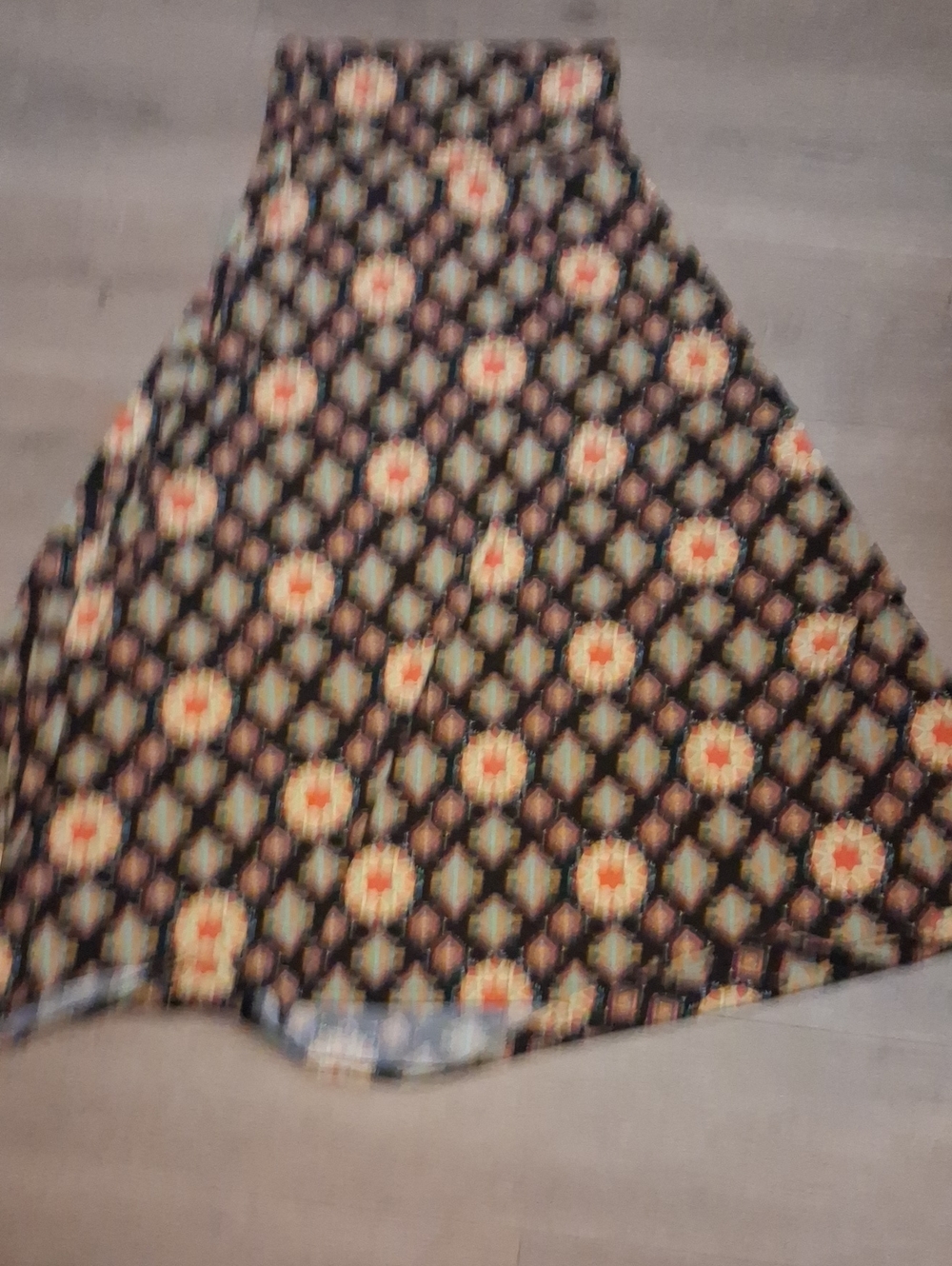 LuLaRoe Black Skater Skirt with Orange & Cream Medallion Pattern